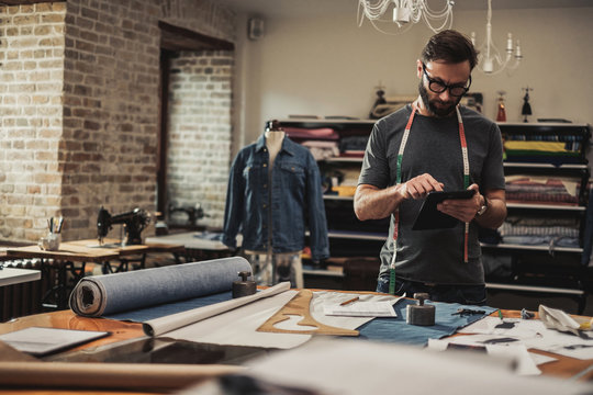 Fashion designer working in his studio