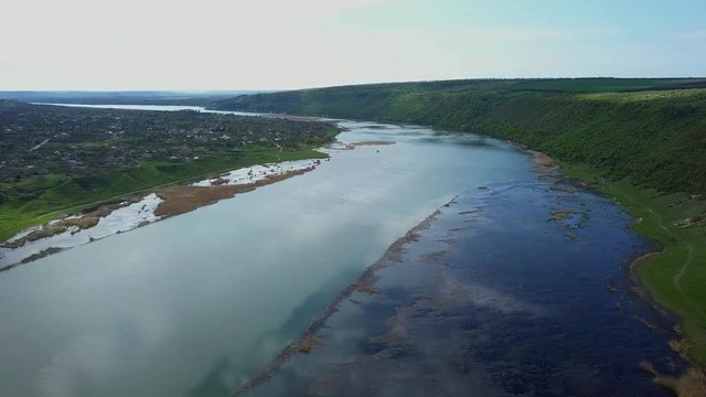 Flight over the river aat spring time. Dniester river of Moldova republic.