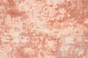 Pink wall of plaster.