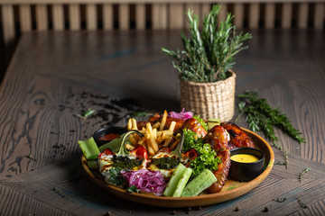 Fried chicken wings and French fries. Menu