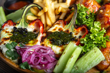 Fried chicken wings and French fries. Menu