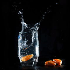 glass with orange splash 