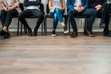 Group of a people waiting for a casting or job interview - obrazy, fototapety, plakaty