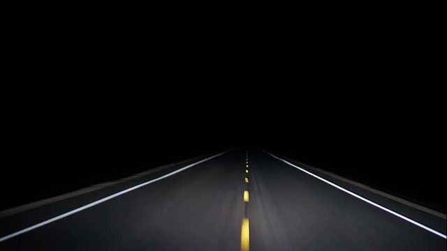 Driving Down Rural Highway In Pitch Black Night Timelapse LoopRunning From The Law Driving Down A Dark Country Highway. The Night Is Dark And The Road Is Long. Loop