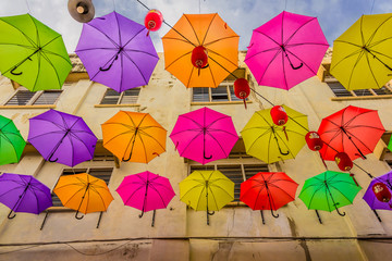 Colorful floating umbrellas