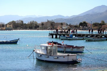 Fototapeta premium cute fishing boats in Sicily, Italy with blue sky and sea