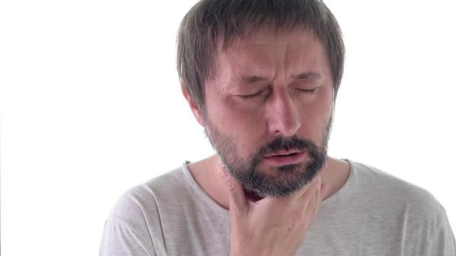 Adult man is coughing, isolated on white background
