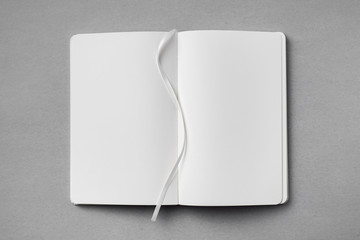 white notebook isolated on grey background