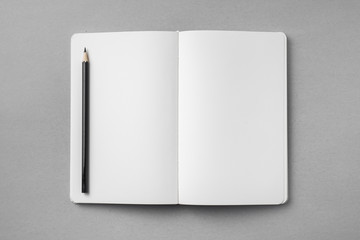 white notebook isolated on grey background