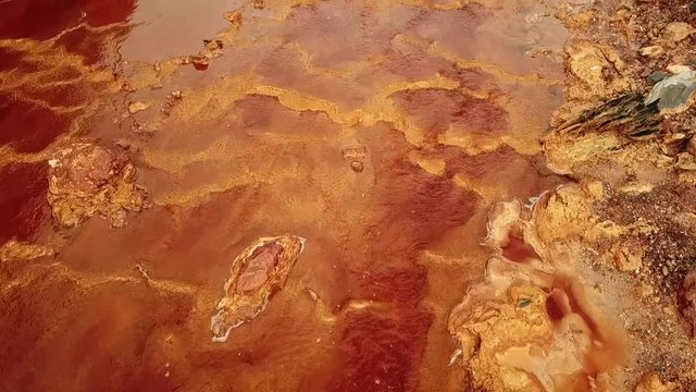 Located in a region that legend claims was part of King Solomon's mines, the Rio Tinto (Huelva, Spain) looks like deep, red wine, because iron is dissolved in the highly acidic river water. Mining act