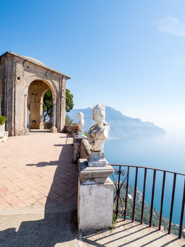 Ravello Italy, April 2019. View of the famous statues and the Mediterranean Sea from the Terrace of Infinity at the gardens of Villa Cimbrone, Ravello, Southern Italy. Photographed at sunny day.