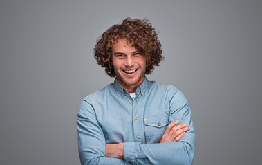 Confident young male looking at camera