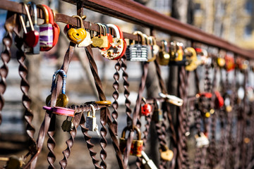 Lock up love. Traditions. Bridge with a lock of love and happiness.
