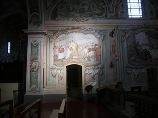 Saint Mary Cathedral in Bobbio. The interior has modern decoration in the three naves, in the presbytery and in the dome. Saint John chapel has a splendid fresco representing the Annunciation.