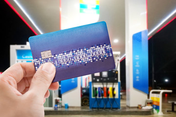 Credit card to make a payment for refueling car on gas station