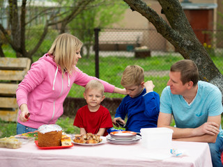 Happy family eating