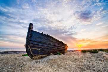 old boat on the beach