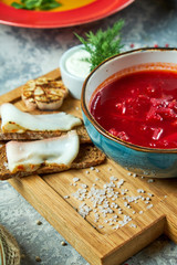 Red soup. Beautiful serving dishes. Restaurant menu