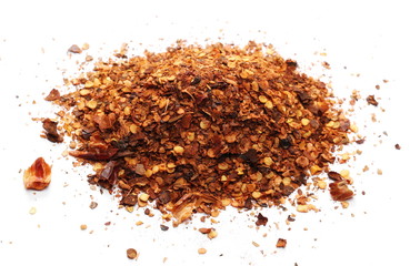 Crushed, ground dry pepper, spicy chopped paprika isolated on white background