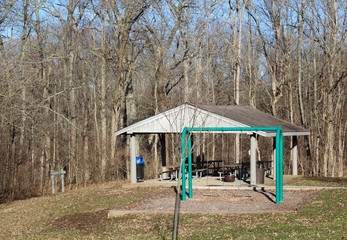 The old wooden picnic shelter in the park.