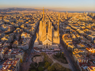 Sagrada Familia cathedral and Barcelona cityscape in Spain, aerial view.