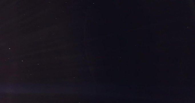 Small Pieces Of Dust Particles Flying On Black Background