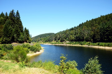 A dam on le Furan river forming beautiful mountain lake. This place in Pilat Regional Natural park is also called Gouffre d'Enfer in French, France.