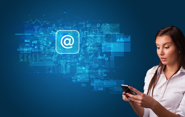 Young person using phone with mail and online communication concept
