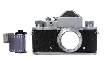 Retro camera  with isolated blank lens for design and cassette with footage film on isolated white background
