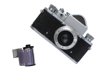 Retro camera with a cassette with footage film on the isolated white background