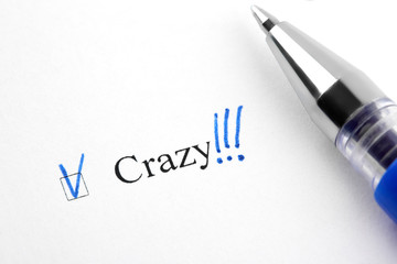 Crazy. Filling in the questionnaire, documents. The checkboxes are filled with a black pen on a white background. Questionnaire, survey.