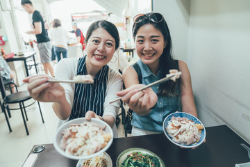 group of best sisters travel in taiwan taipei eating local meal turkey rice sharing to camera...