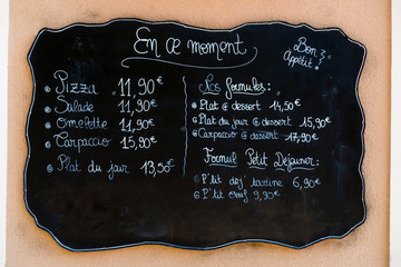 Blackboard handwritten menu outside a french restaurant