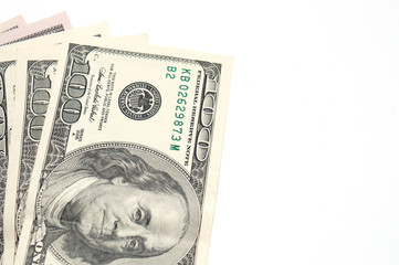 Money dollars close up on white background, isolate, copy space from right
