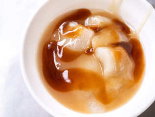 Bawan (Ba wan), taiwanese meatball delicacy, delicious street food, fried starch wrapped round shaped dumpling with pork inside, close up, copy space