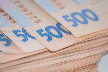 Obraz premium Money Ukrainian hryvnia big bundle of bills, close-up, copy space