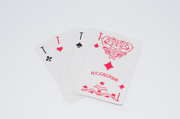 Playing cards on white background, copy space for text.