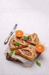 Pieces of sweet cake with jam