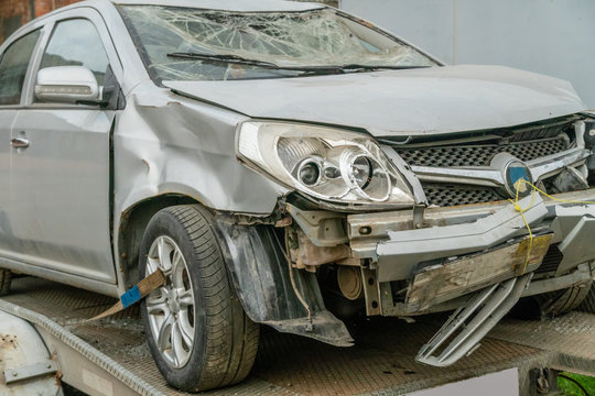 broken gray car close up. accident concept