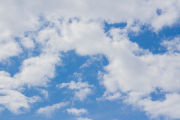 Blue sky white cumulus clouds background