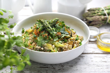 Green salad with asparagus and green beans. A healthy vegetable vegetarian diet.