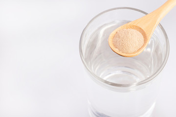 Amla powder and glass with water - Phyllanthus emblica.