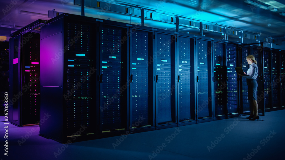 Aufkleber In Data Center: IT Technician Running Maintenance Programme on Laptop, Controls Operational Server Rack Optimal Functioning. Modern High-Tech Telecommunications Operational Data Center in Neon Lights.