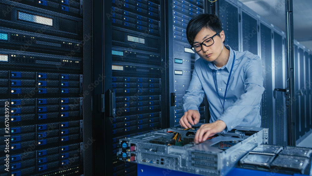 Poster In the Modern Data Center: IT Technician Working with Server Racks, on a Pushcart Various Equipment Needed for Installing New Hard Drives, Doing Hardware Maintenance and Diagnostics.