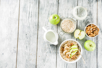 Healthy breakfast oatmeal with nuts ad fruits