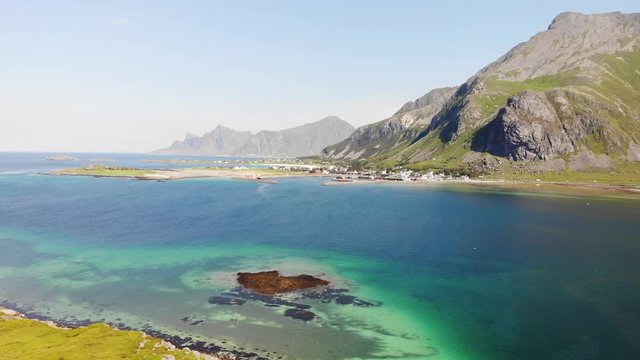 Sea with mountains, norwegian summer landscape on Lofoten archipelago Nordland county, Norway. Tourist attraction