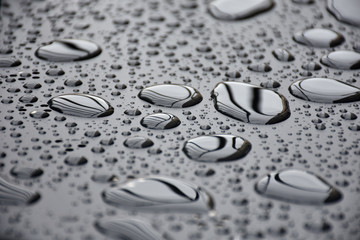 Close up water drops on metal surface can be used for web design