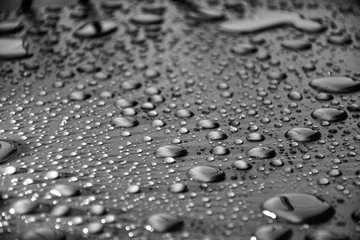Close up water drops on metal surface can be used for web design