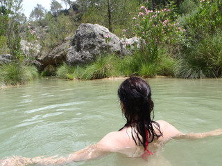 Fototapeta premium woman bathing in a lake