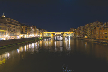 Romantic Night view over the Arno River in Florence with Ponte Vecchio